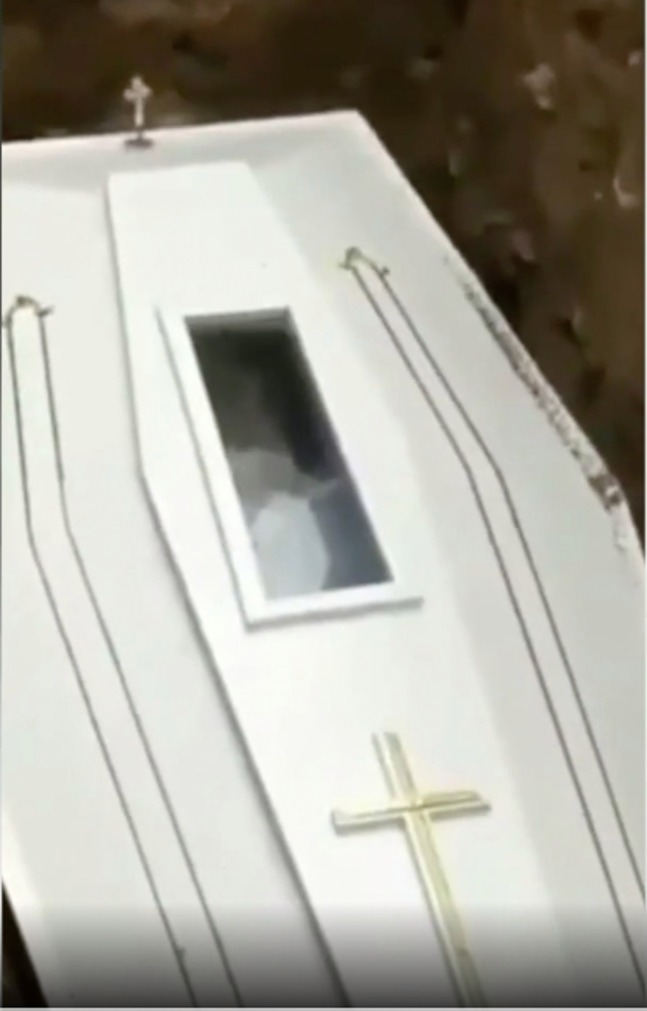 Corpse waves from inside a coffin in Indonesia, video goes viral