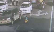 SHOCKING: Toddler takes toy car on busy road, gets rescued by traffic police