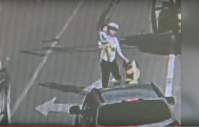 SHOCKING: Toddler takes toy car on busy road, gets rescued by traffic police