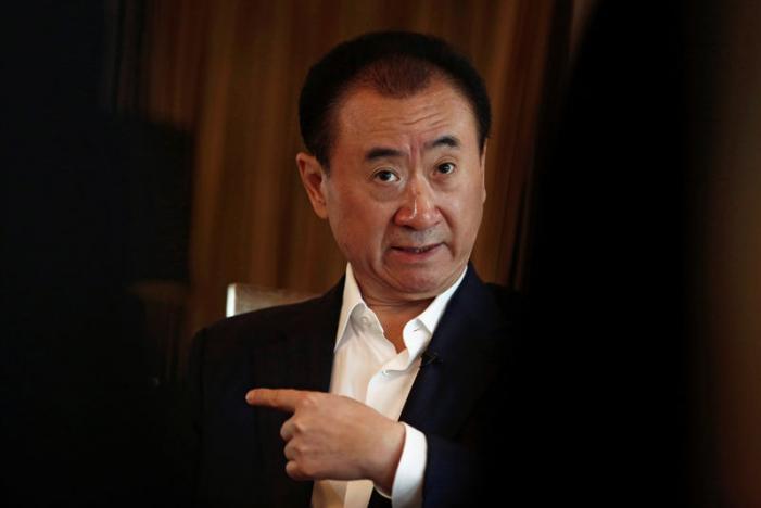 Who is Wang Jianlin, and what's behind his obsession with Holly-wood assets?