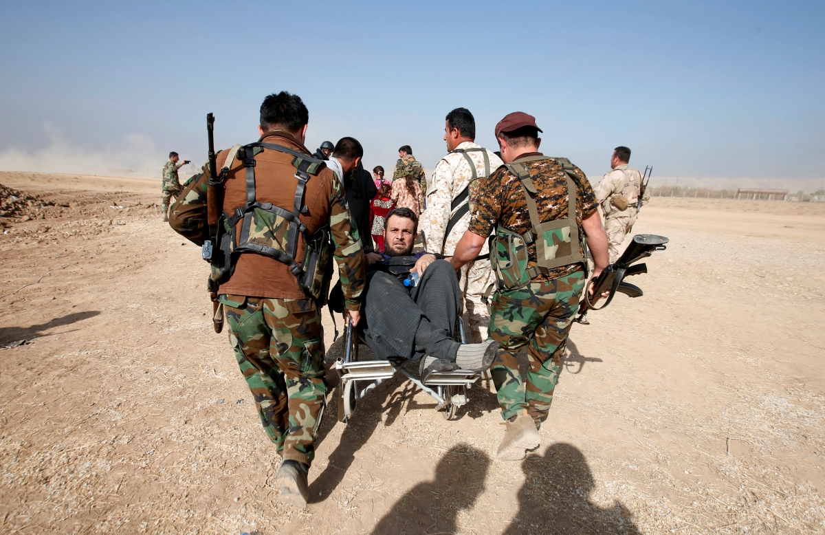 Heartwarming images of Iraqi people escaping from Islamic State-controlled village of Abu Jarboa