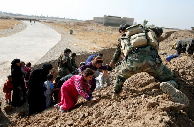 Heartwarming images of Iraqi people escaping from Islamic State-controlled village of Abu Jarboa