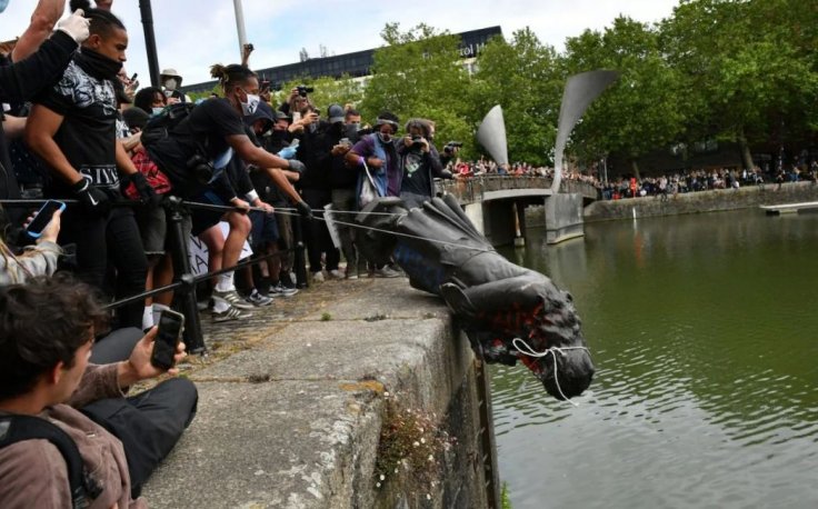 Statue of Edward Colston thrown into Bristol Harbour Statue of Edward Colston thrown into Bristol Harbour