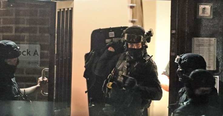 Counter-terrorism police storm a flat Counter-terrorism police storm a flat