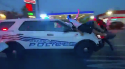 Detroit Police Plows Through Crowd