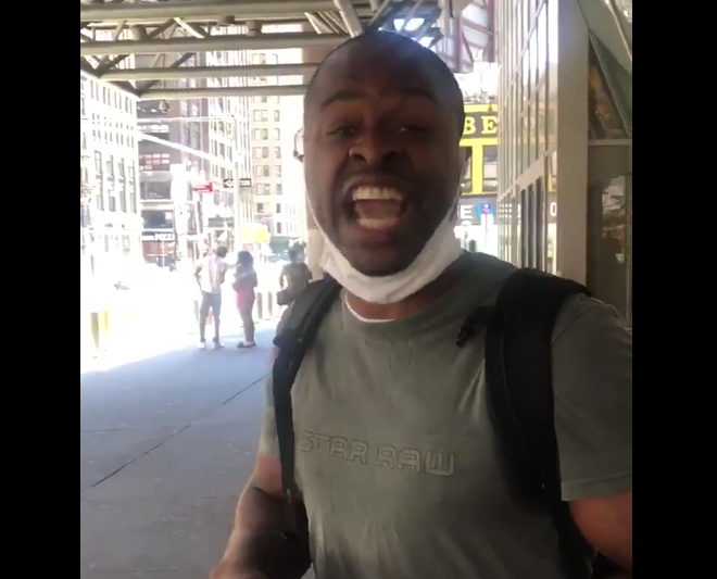 A black man was filmed hurling insults at a Hispanic woman calling her a &a...