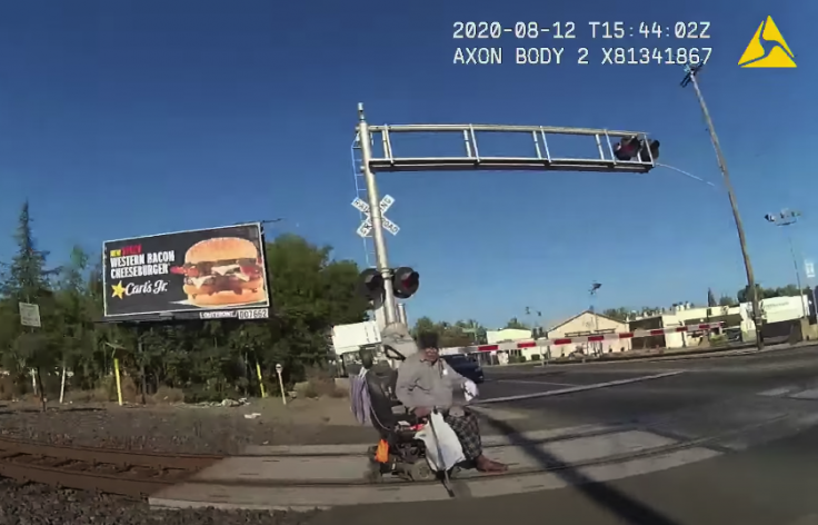 Officer saves man from oncoming train Officer saves man from oncoming train