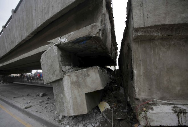 At least 2 killed, 4 injured after overhead bridge collapses in Malaysia