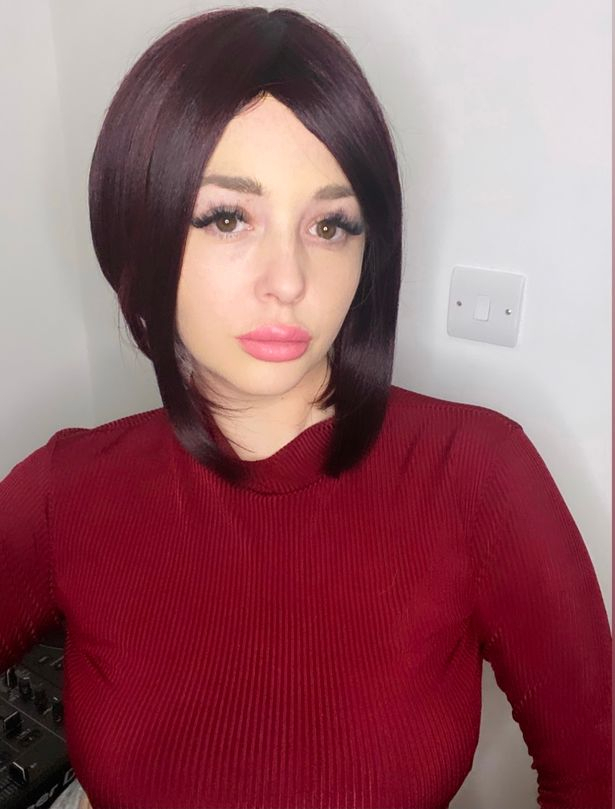 Jodie Weston in a brunette wig