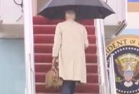 Biden almost trips again Biden almost trips again