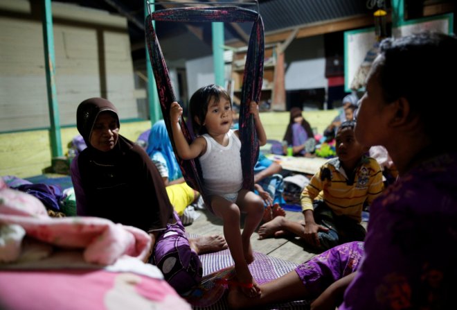 In Pictures: Heartwarming images of Aceh earthquake that killed more than 100