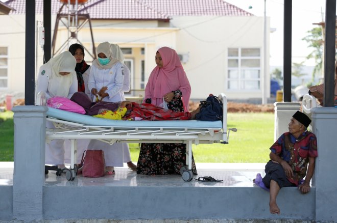 In Pictures: Heartwarming images of Aceh earthquake that killed more than 100