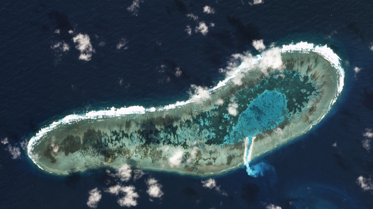 Vietnam dredges on disputed reef in South China Sea