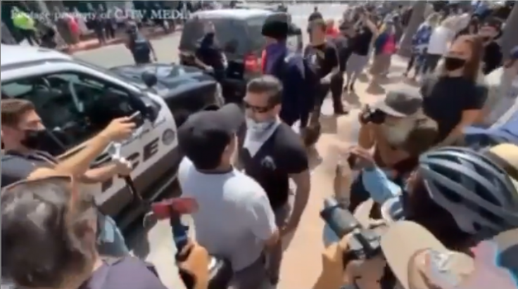 White Lives Matter member punches Asian Man White Lives Matter member punches Asian Man