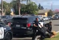 Cop punching woman Cop punching woman