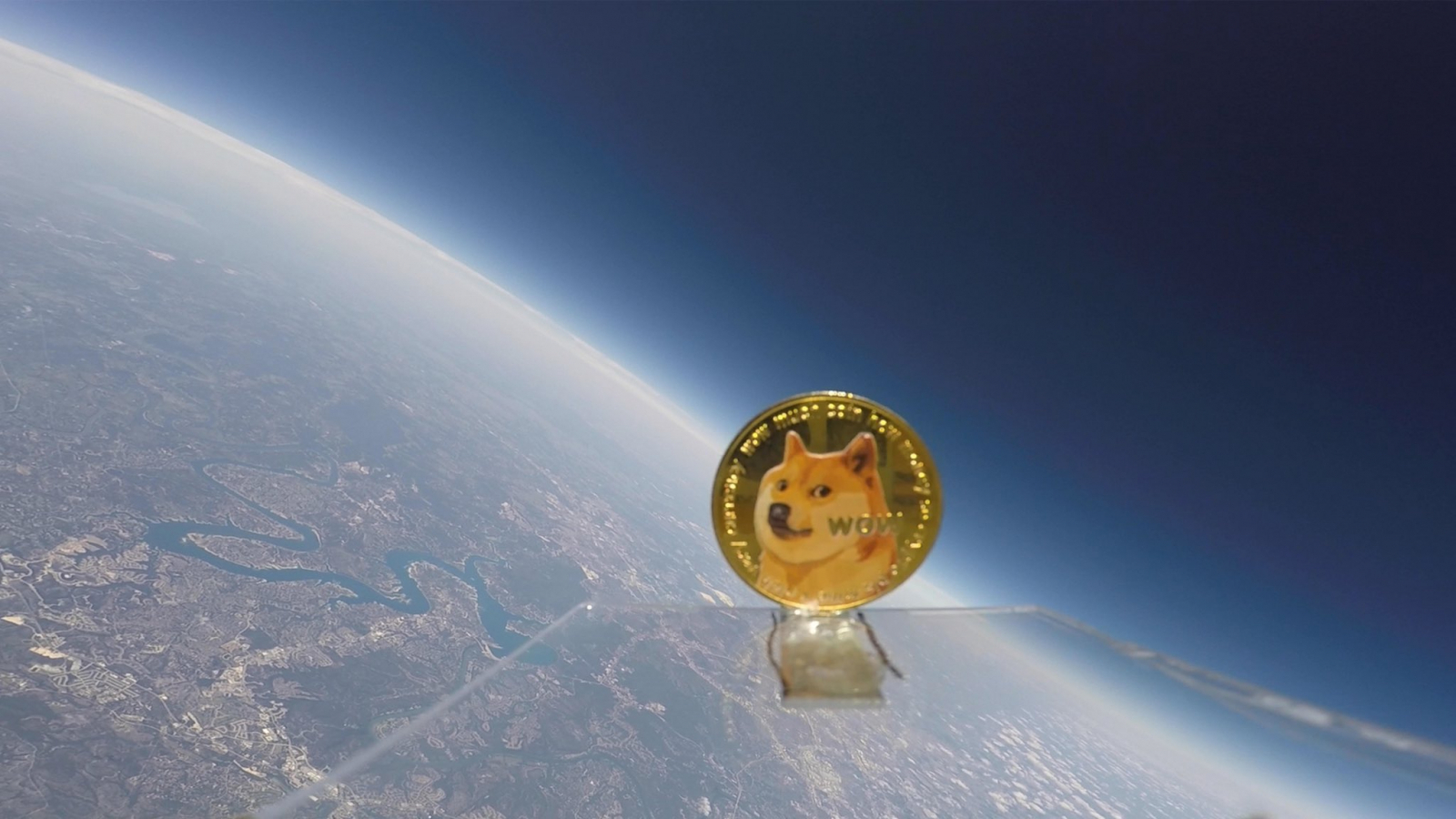 Dogecoin cryptucurrency flies in space moon 