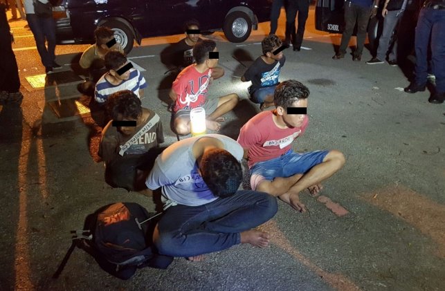 8 Indonesian men arrested