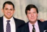 Tucker Carlson pictured with Anton Lazzaro