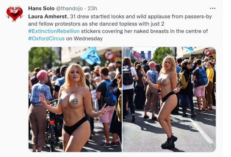 Topless Woman Covers Nipples with Stickers