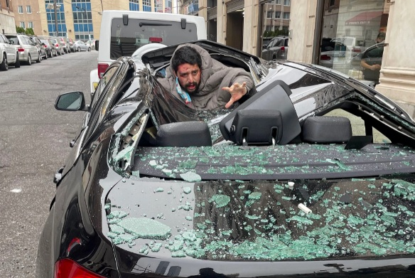 Man falls on BMW Man falls on BMW