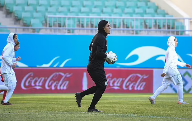 Zohreh Koudaei (in black) Zohreh Koudaei (in black)