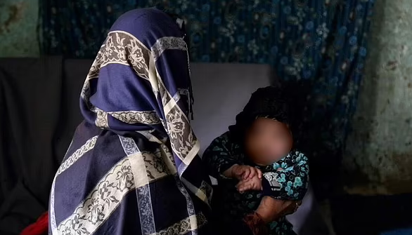 The woman pictured with her baby girl The woman pictured with her baby girl