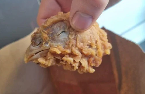 Chicken head found in KFC meal Chicken head found in KFC meal