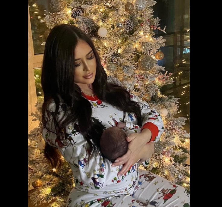 Maralee Nichols with Thompson's newborn
