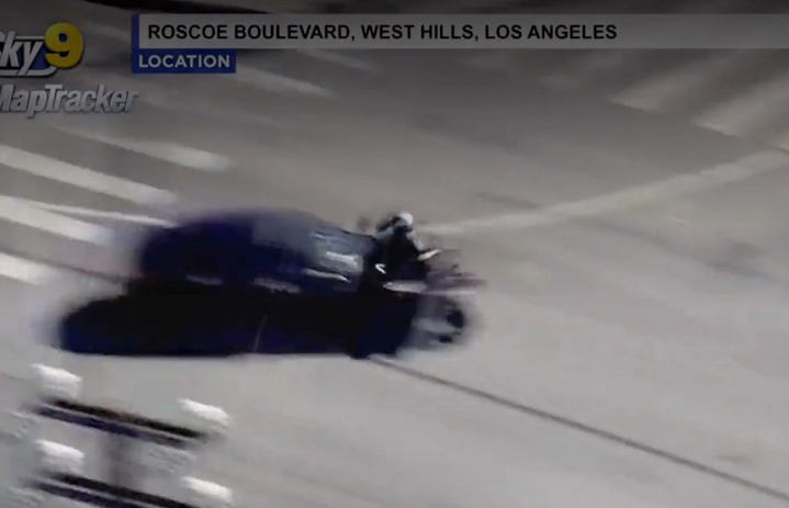 Biker slammed into a vehicle during a police chase