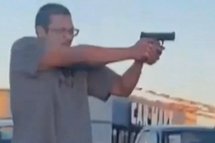  Screen grab of the video showing the man firing the gun