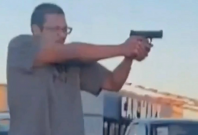  Screen grab of the video showing the man firing the gun
