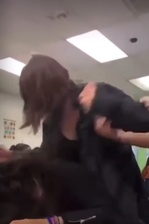 Screen of the video showing the classroom beating Screen of the video showing the classroom beating