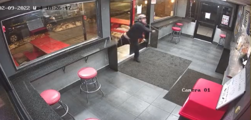 Footage of the man throwing snow at the employees Footage of the man throwing snow at the employees
