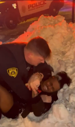  Video showing Adonis Tuggle being pinned on the ground by the unnamed officer 