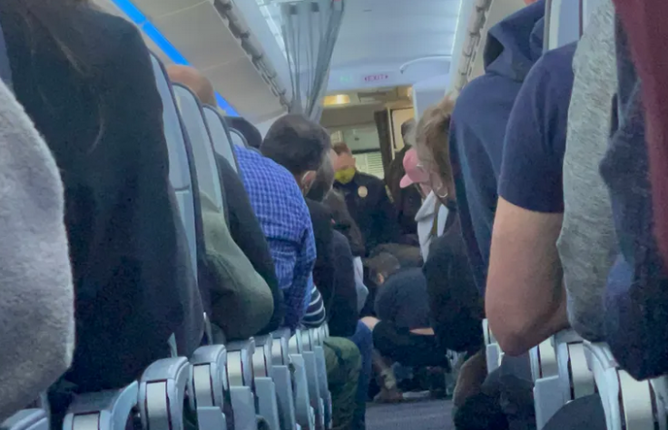 The rowdy passenger had to be subdued by fellow travelers and flight attendants The rowdy passenger had to be subdued by fellow travelers and flight attendants