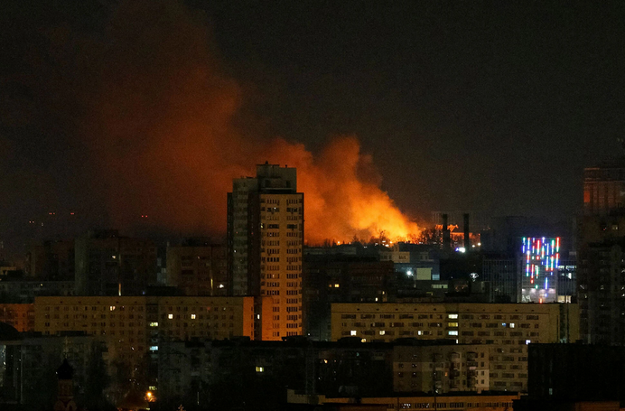 Smoke and flames can be seen over Kyiv as Russia continues its invasion of Ukraine 