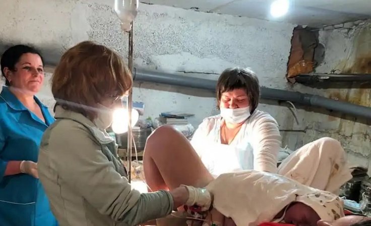 woman gives birth woman gives birth