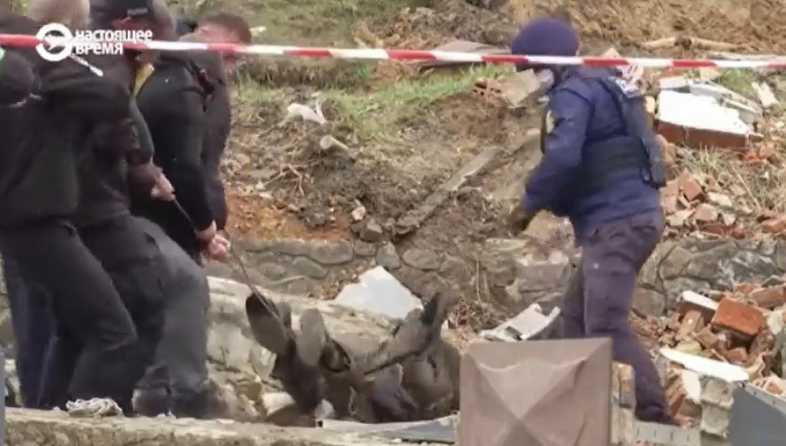 Body pulled out from manhole