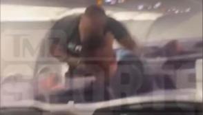 Mike Tyson punching passenger