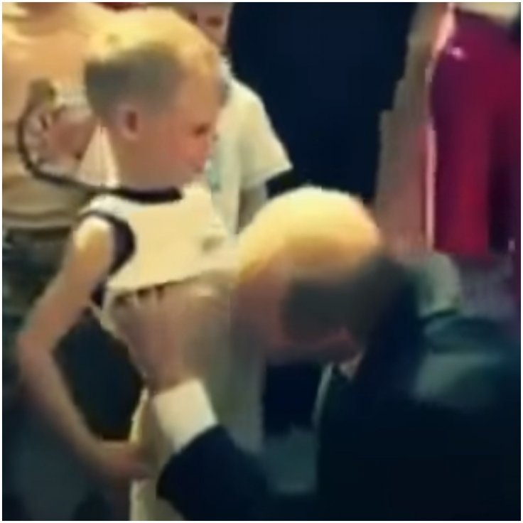 Vladimir Putin kissing naked belly 