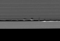 Daphnis creating weaves in Saturn's rings