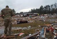 Storms kill 18 people in Georgia
