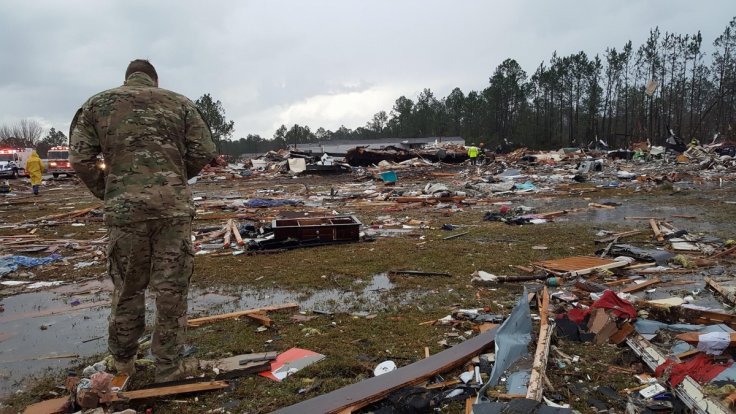 Storms kill 18 people in Georgia