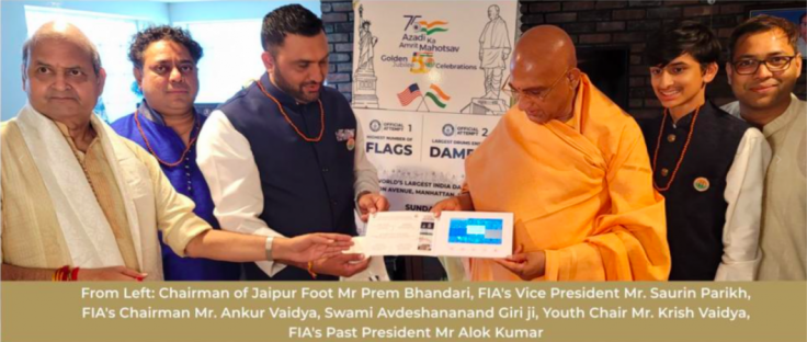 The poster for the FIA parade was unveiled in June by noted Indian seer Juna Peethadheeshwar Acharya Mahamandaleshwar Swami Avdheshanand Giri The poster for the FIA parade was unveiled in June by noted Indian seer Juna Peethadheeshwar Acharya Mahamandaleshwar Swami Avdheshanand Giri