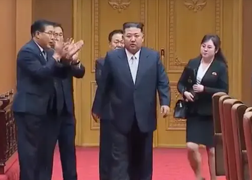 Kim Jong Un with unidentified woman