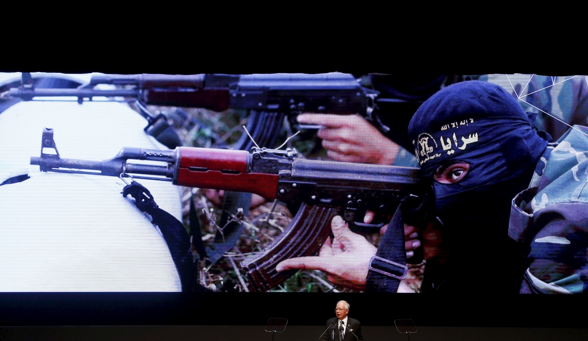 Malaysia arrests 13 people with suspected link to Isis cells