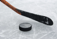 hockey stick and a puck hockey stick and a puck