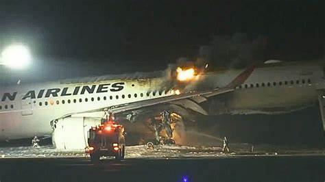 Japan Airlines Flight Engulfed in Flames at Haneda Airport after ...