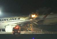 japan airlines catches fire