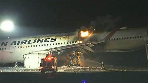 japan airlines catches fire